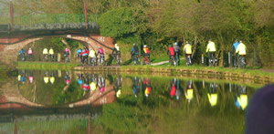 Riders approaching the Boat Museum along the canal in Ellesmere Port Riders approaching the Boat Museum along the canal in Ellesmere Port