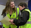 Wirral South MP, Alison McGovern, presenting a certificate of cycling achievement to a student from Eastham Centre.