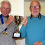 Reg Waud receiving the President's Trophy from Mike Cross.